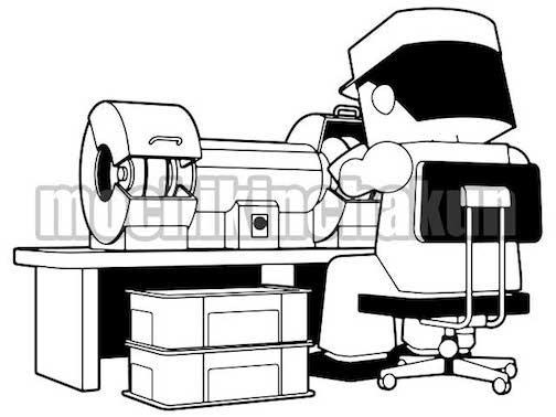 両頭グラインダーで研磨する作業員