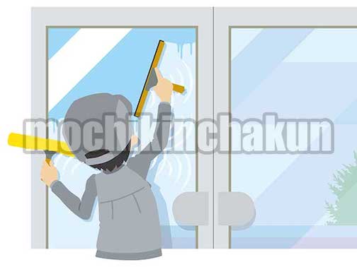 ガラス窓をクリーニングする清掃業者